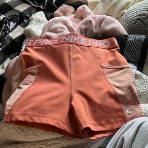 orange nike pros md